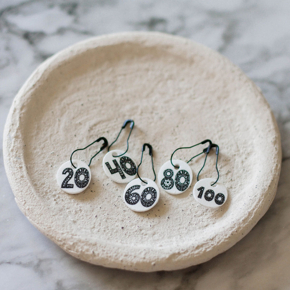 KT and the Squid Handmade Acrylic Stitch Markers with Numbered Hand - Drawn Patterns