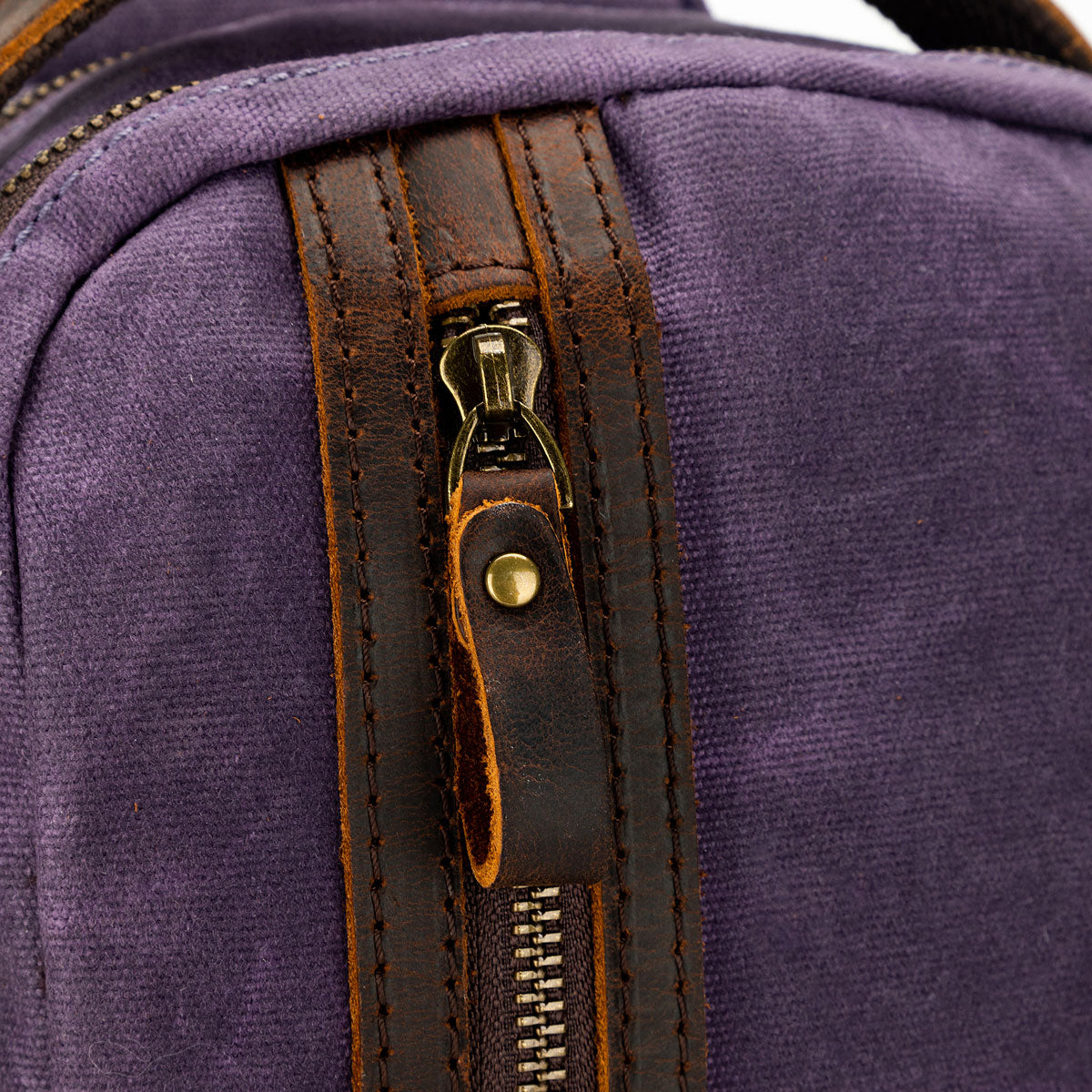 della Q Maker's Mini Purple Messenger: Stylish & Portable